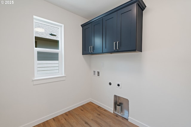 11108 NE 91st Ave, Vancouver, WA 98662 - clothes washing area featuring cabinet space, light wood-type flooring, electric dryer hookup, hookup for a washing machine, and baseboards