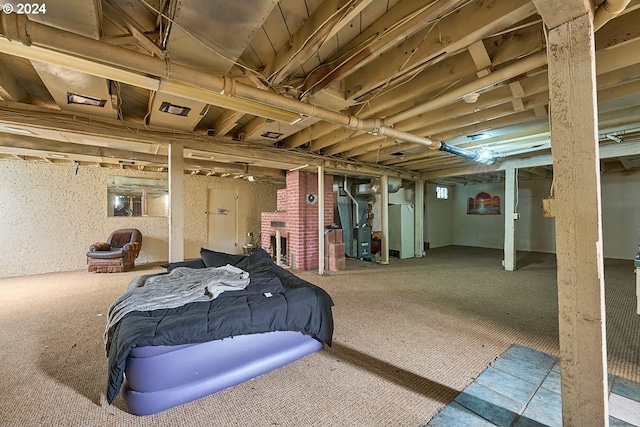 basement featuring a fireplace