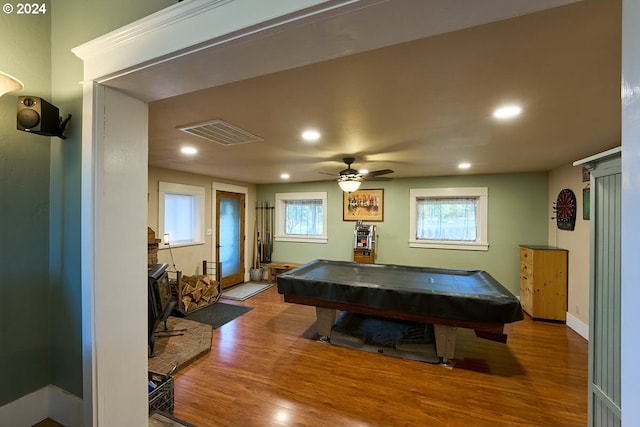 game room featuring ceiling fan, a healthy amount of sunlight, wood-type flooring, and billiards