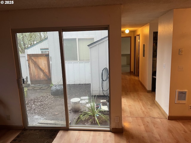 doorway to outside featuring light hardwood / wood-style floors