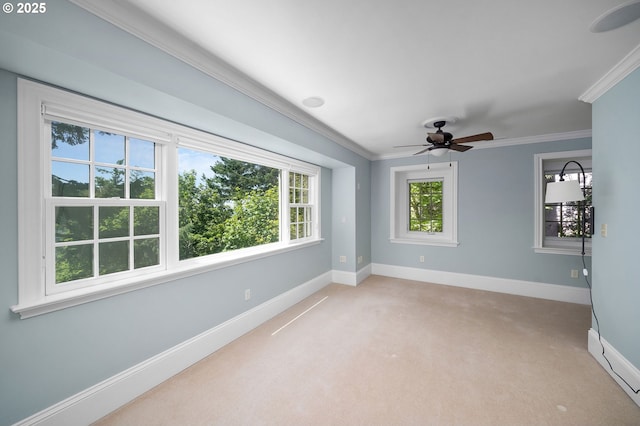 4243 SW Bertha Ave, Portland, OR 97239 - empty room with light colored carpet, crown molding, and a ceiling fan
