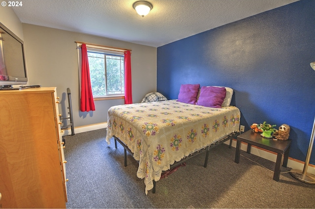 bedroom featuring a textured ceiling