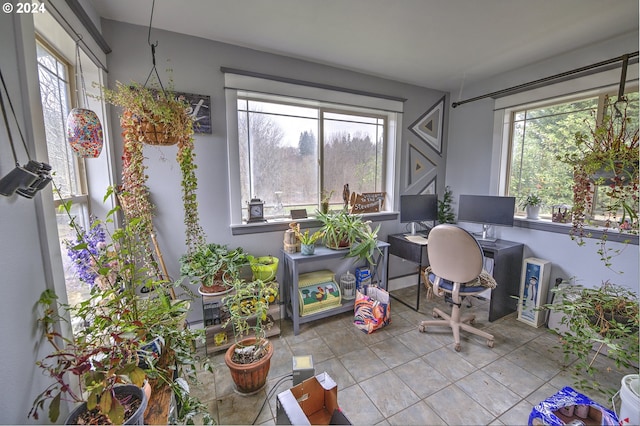 office area featuring light tile patterned flooring and plenty of natural light