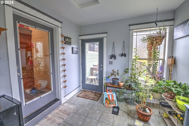 doorway featuring light tile patterned floors