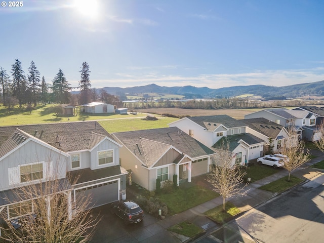 birds eye view of property featuring a residential view and a mountain view