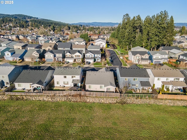 aerial view with a mountain view and a residential view