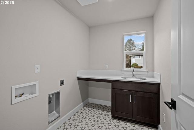 laundry room featuring washer hookup, cabinets, sink, and hookup for an electric dryer