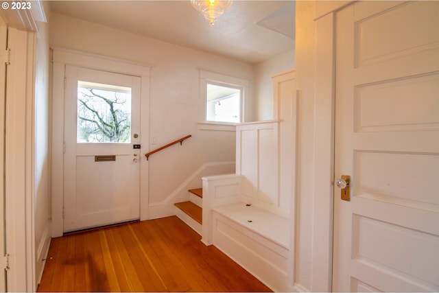 doorway with hardwood / wood-style floors