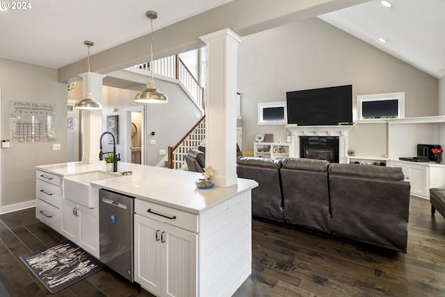 kitchen with white cabinets, sink, dark hardwood / wood-style floors, and dishwasher