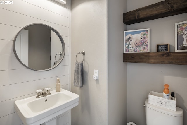 bathroom with sink and toilet