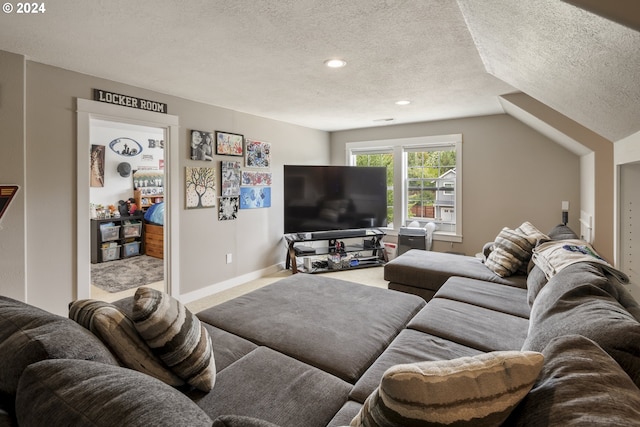 carpeted living room with vaulted ceiling and a textured ceiling