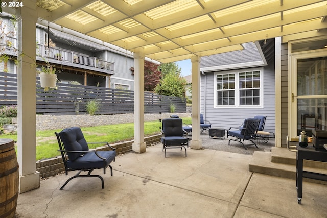 view of patio featuring a pergola and an outdoor hangout area