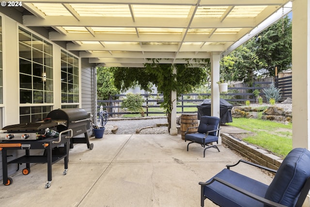 view of patio featuring a pergola and grilling area