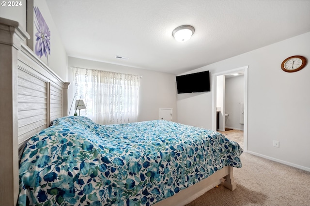 bedroom featuring light colored carpet