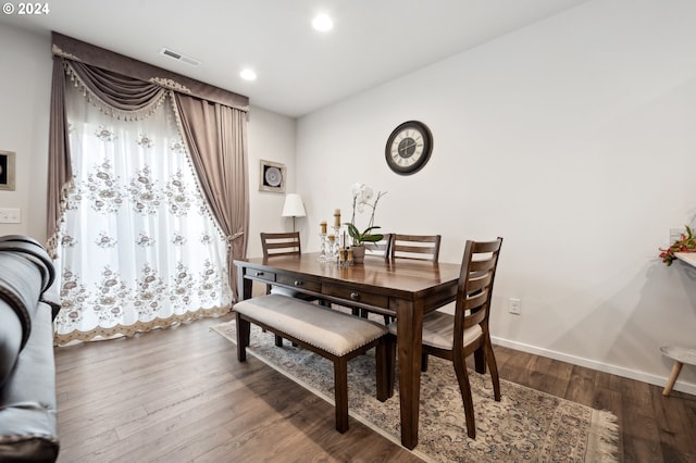 dining area featuring hardwood / wood-style flooring