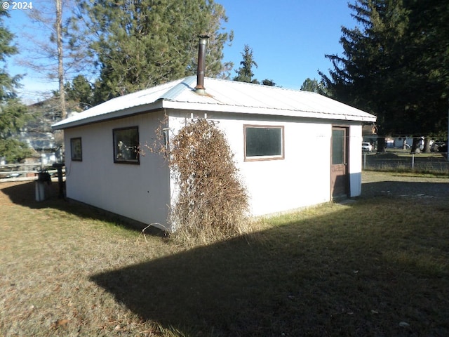 view of home's exterior featuring a yard