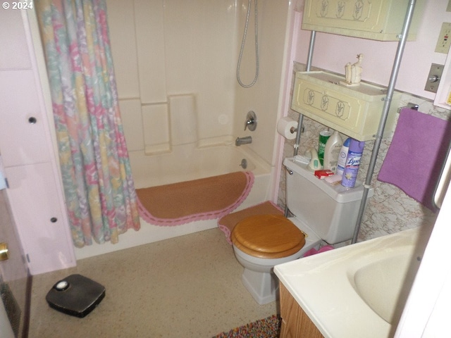 full bathroom with shower / tub combo, vanity, and toilet