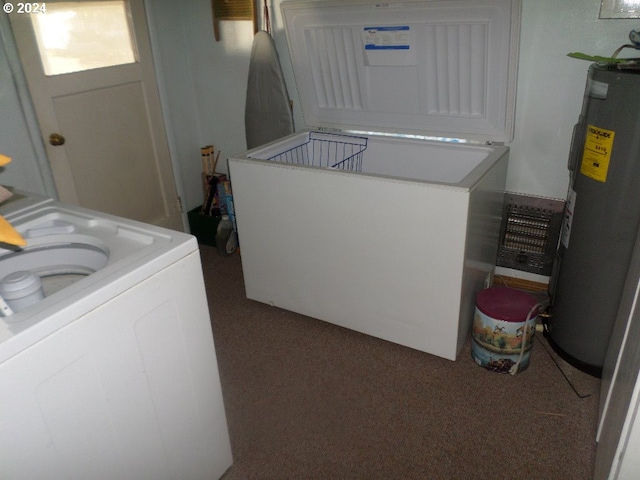 laundry room featuring carpet floors, washer / clothes dryer, and water heater