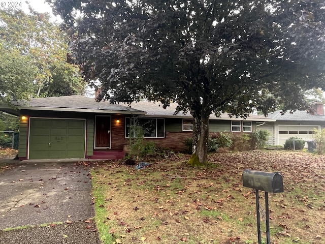 319 Charlotte Way, Vancouver, WA 98664 - ranch-style home featuring a garage, fence, driveway, and a chimney