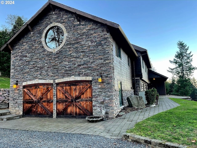 view of home's exterior with a lawn