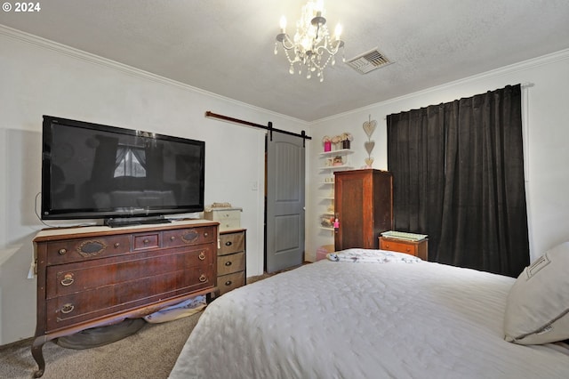 carpeted bedroom with ornamental molding, a chandelier, a textured ceiling, and a barn door