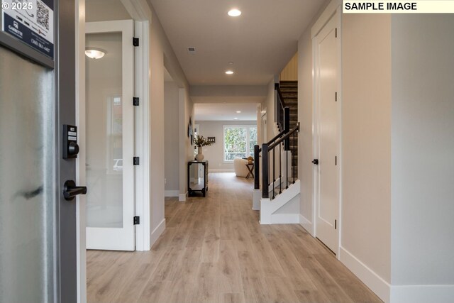 8065 N Hargrave St, Camas, WA 98607 - hallway featuring dark hardwood / wood-style floors and a high ceiling