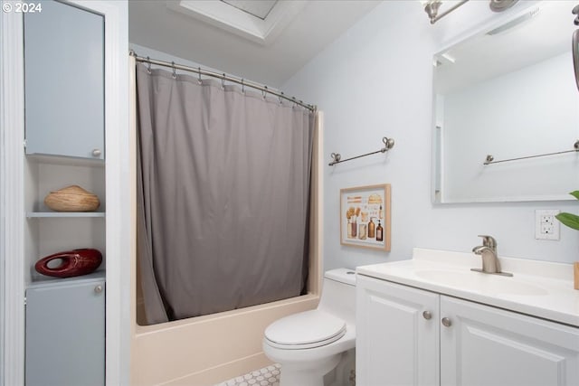 full bathroom featuring toilet, vanity, and shower / tub combo with curtain