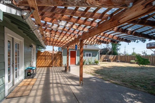 view of patio / terrace featuring an outdoor structure and a pergola