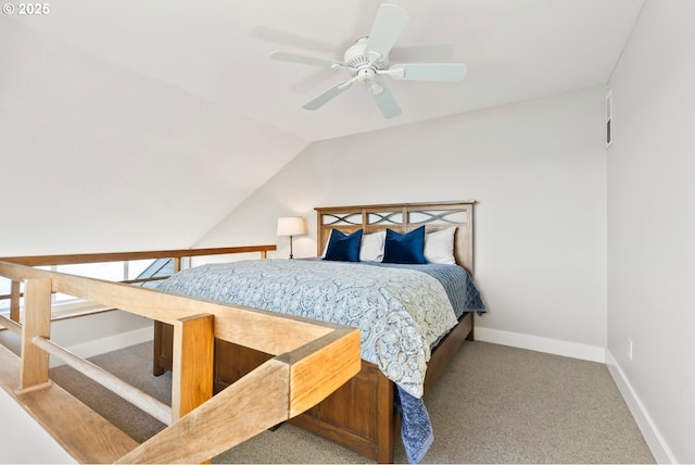 carpeted bedroom featuring vaulted ceiling, a ceiling fan, and baseboards