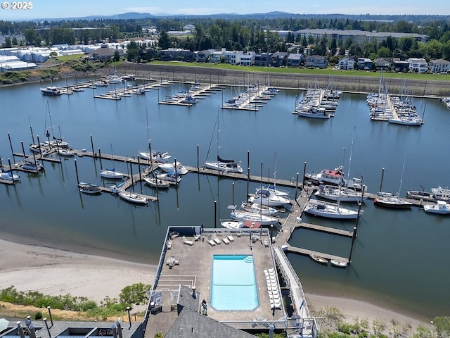 birds eye view of property featuring a water view