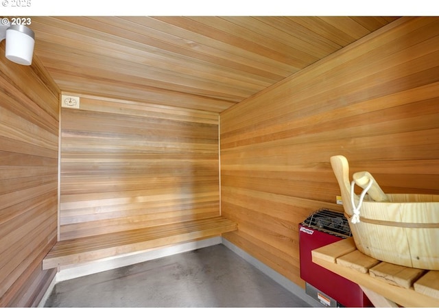 view of sauna featuring concrete flooring