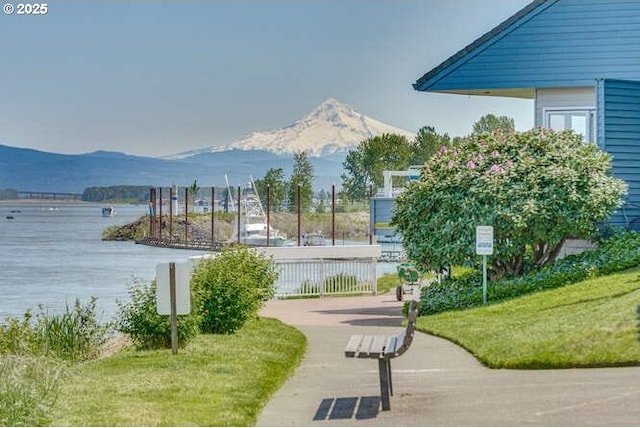 view of property's community featuring a water and mountain view