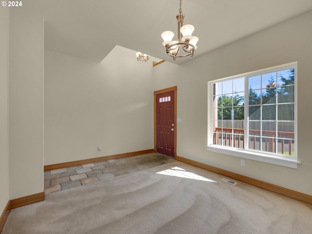 interior space with a chandelier