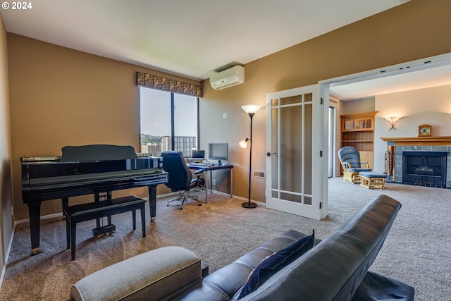 carpeted office with a wall unit AC and a tile fireplace