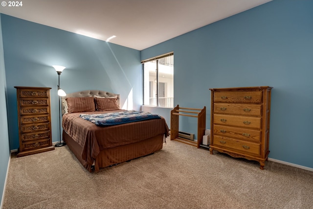 carpeted bedroom with baseboard heating