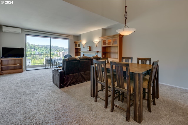 dining room featuring carpet and a wall mounted air conditioner