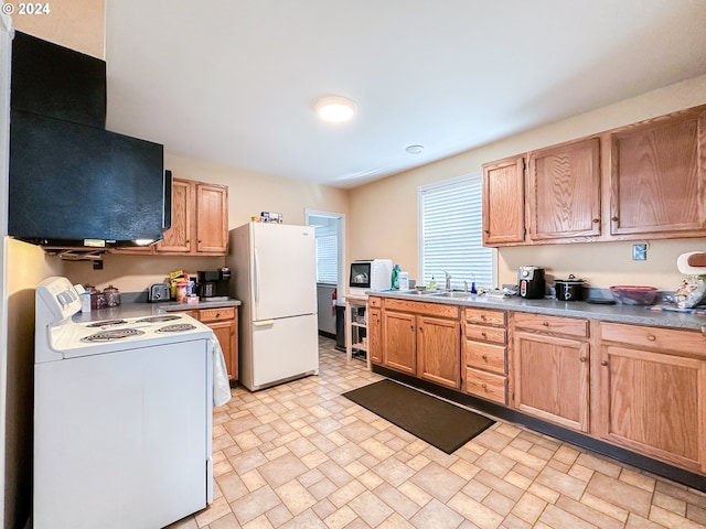 kitchen with light tile floors, range hood, white appliances, and sink