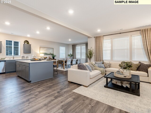 unfurnished living room featuring dark hardwood / wood-style flooring