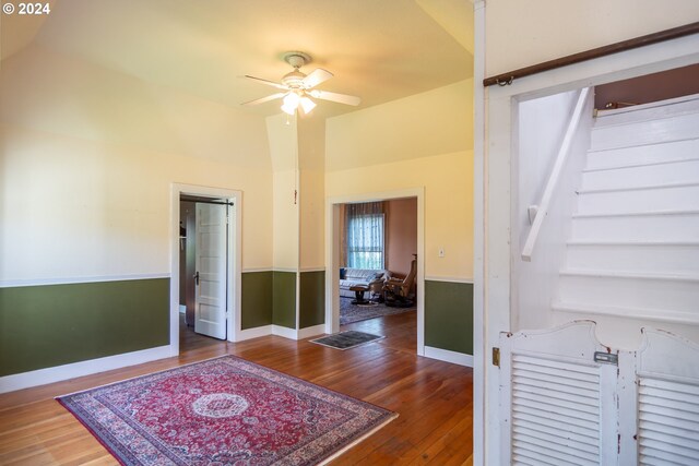 entryway featuring ceiling fan and wood-type flooring