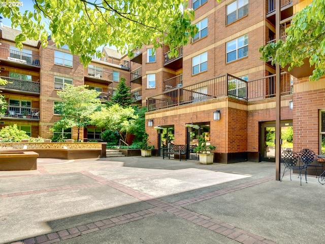 surrounding community featuring a patio area