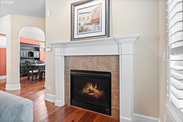 details featuring a fireplace and hardwood / wood-style floors