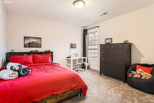 13516 NW Glendoveer Dr, Portland, OR 97231 - bedroom with carpet flooring, a textured ceiling, and baseboards