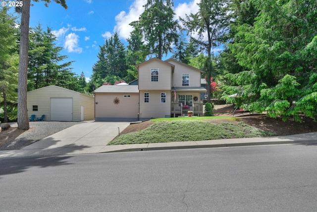 87973 Sherwood St, Veneta, OR 97487 - view of front facade featuring an outbuilding, driveway, and a garage