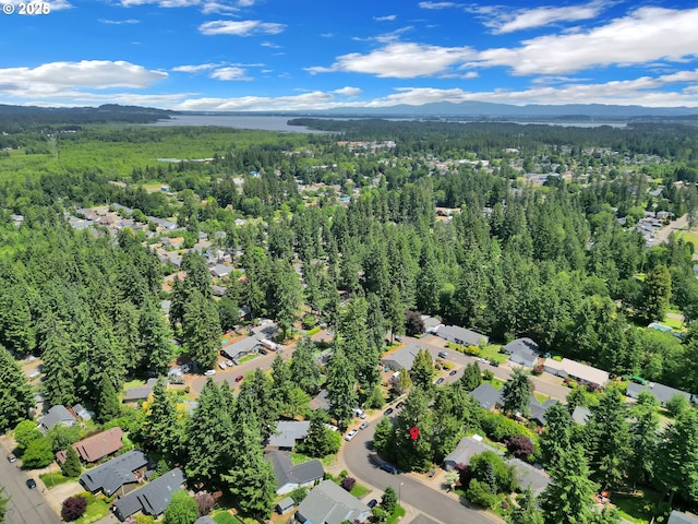87973 Sherwood St, Veneta, OR 97487 - aerial overview of property's location featuring a forest and a mountainous background