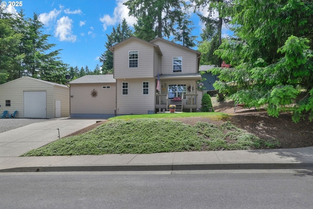 87973 Sherwood St, Veneta, OR 97487 - view of front facade featuring an outbuilding, a detached garage, and concrete driveway