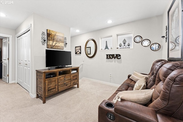 living room featuring light carpet