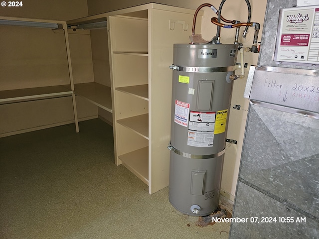 utility room featuring secured water heater and heating unit