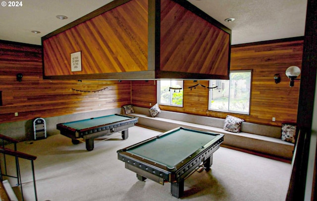 recreation room with wood walls, light colored carpet, and billiards