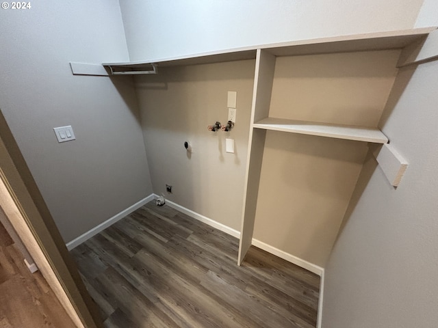 clothes washing area with washer hookup, dark hardwood / wood-style floors, and hookup for an electric dryer