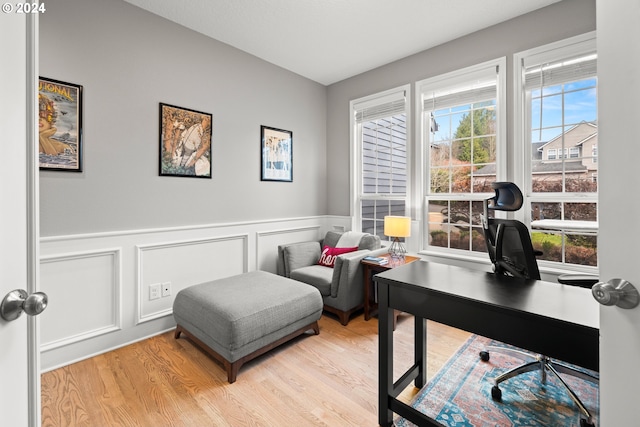 office space with light hardwood / wood-style flooring